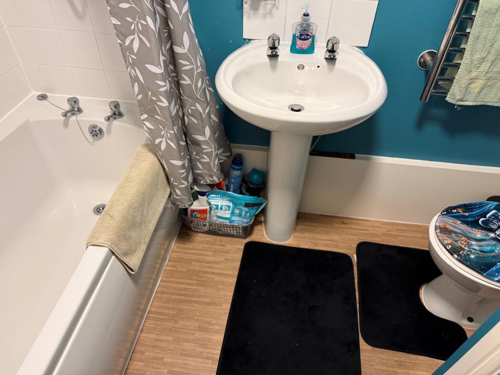 Lot: 161 - DETACHED BUNGALOW IN TOWN CENTRE - Bathroom sink and WC with white suite